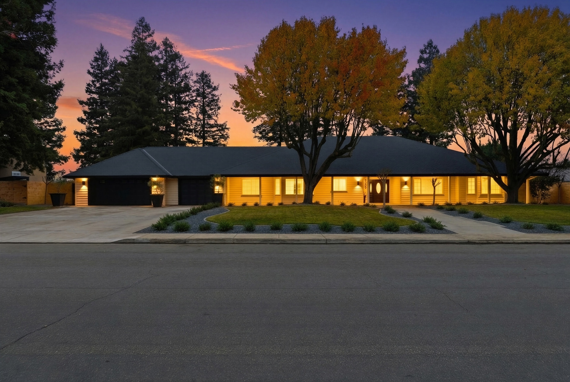 Wide front view of 7304 Spy Glass Dr at sunset